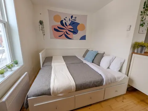 Sofa or daybed set up for sleeping