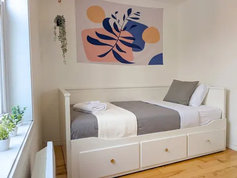 Sofa or daybed set up for sleeping
