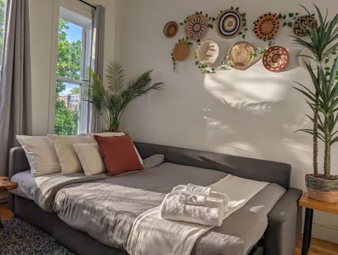 Sofa or daybed set up for sleeping