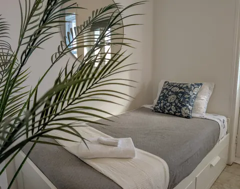 Sofa or daybed set up for sleeping