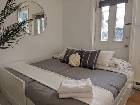 Sofa or daybed set up for sleeping